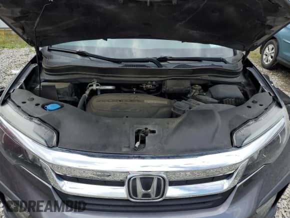 2019 Honda Pilot LX с VIN 5FNYF5H19KB028217, выставлен на аукционе Copart как лот 58665345 с пробегом Не указан миль и Списание • Salvage title. История ставок и продаж доступна на DreamBid. Изображение 12.