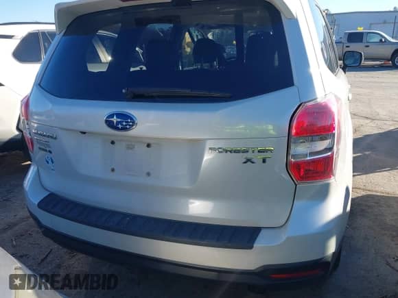 2014 Subaru Forester XT Touring z VIN JF2SJGPC9EH417920, wystawiony jako IAAI lot #41270689 z przebiegiem 184 976 mil mil oraz . Historia ofert i sprzedaży dostępna na DreamBid. Obrazek 16.