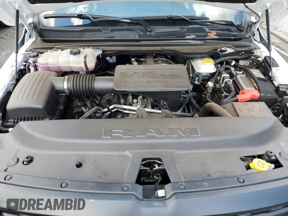 2025 Ram 1500 Tradesman with VIN 1C6RREGG8SN552310, listed as a Copart auction lot 56547005 with 9,767 mi miles and Salvage title. Bid and sale history available at DreamBid. Image 11.