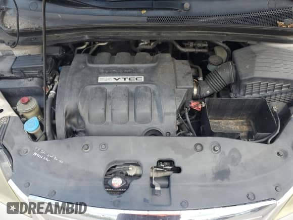 2005 Honda Odyssey EX с VIN 5FNRL38425B018158, выставлен на аукционе Copart как лот 68673385 с пробегом Не указан миль и Списание • Salvage title. История ставок и продаж доступна на DreamBid. Изображение 12.