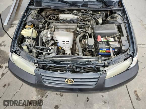 1997 Toyota Camry LE with VIN 4T1BG22KXVU821763, listed as a Copart auction lot 71875345 with 205,057 mi miles and Salvage title. Bid and sale history available at DreamBid. Image 11.