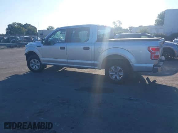 2019 Ford F-150 XL with VIN 1FTEW1CB9KFB00458, listed as a IAAI auction lot 43163027 with 120,980 mi miles and . Bid and sale history available at DreamBid. Image 14.