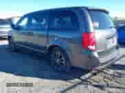 2014 Dodge Grand Caravan SE with VIN 2C4RDGBGXER462531, listed as a IAAI auction lot 43460855 with 128,065 mi miles and . Bid and sale history available at DreamBid. Image 3.