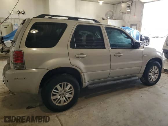 2007 Mercury Mariner Premier with VIN 4M2CU97107KJ05778, listed as a Copart auction lot 60433475 with 218,344 mi miles and Salvage title. Bid and sale history available at DreamBid. Image 3.