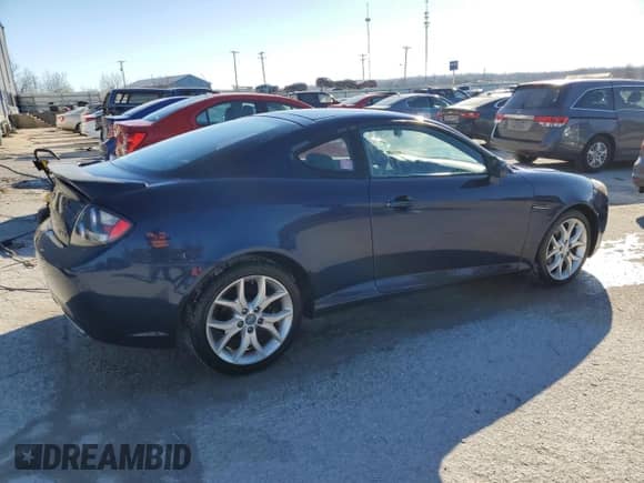 2008 Hyundai Tiburon GT с VIN KMHHN66F98U283680, выставлен на аукционе Copart как лот 42303185 с пробегом 85 567 миль миль и Списание • Salvage title. История ставок и продаж доступна на DreamBid. Изображение 3.
