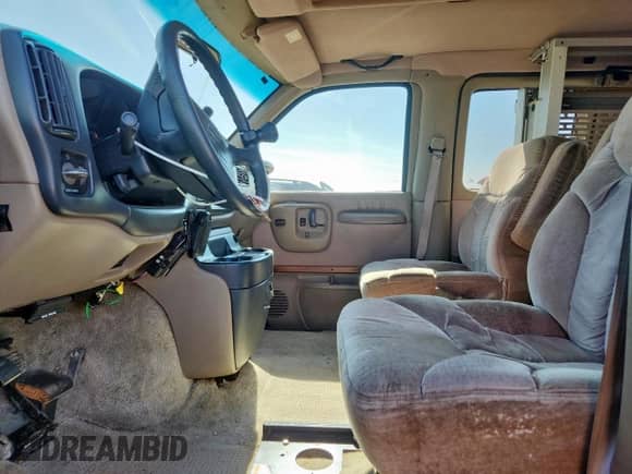 1996 Chevrolet Chevy Van with VIN 1GBFG15R1T1029285, listed as a Copart auction lot 60969105 with 233,088 mi miles and Salvage title. Bid and sale history available at DreamBid. Image 7.