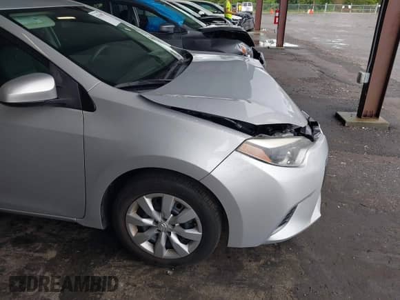 2016 Toyota Corolla L with VIN 2T1BURHE5GC534631, listed as a IAAI auction lot 43330394 with 34,465 mi miles and . Bid and sale history available at DreamBid. Image 6.