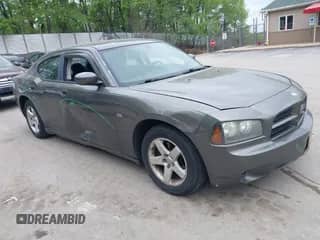 2010 Dodge Charger 3.5L with VIN 2B3CA2CV0AH251239, listed as a IAAI auction lot 42244252 with 168,138 mi miles and . Bid and sale history available at DreamBid. Image 1.