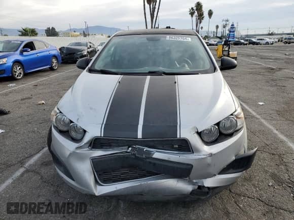 2012 Chevrolet Sonic LT z VIN 1G1JD5SB5C4180537, wystawiony jako Copart lot #86329704 z przebiegiem 134 506 mil mil oraz Szkoda całkowita • Salvage title. Historia ofert i sprzedaży dostępna na DreamBid. Obrazek 5.