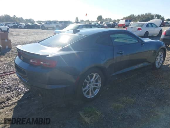 2021 Chevrolet Camaro 1LS with VIN 1G1FB1RX5M0130963, listed as a IAAI auction lot 43284790 with 57,472 mi miles and . Bid and sale history available at DreamBid. Image 4.