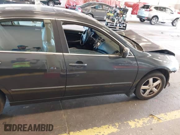 2005 Honda Accord EX-L with VIN 1HGCM568X5A179629, listed as a IAAI auction lot 42794590 with 197,452 mi miles and . Bid and sale history available at DreamBid. Image 14.