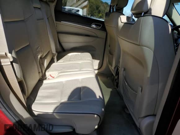 2015 Jeep Grand Cherokee Overland с VIN 1C4RJFCG5FC922447, выставлен на аукционе Copart как лот 82771405 с пробегом 118 758 миль миль и Списание • Salvage title. История ставок и продаж доступна на DreamBid. Изображение 11.