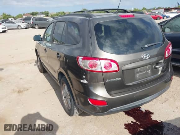 2012 Hyundai Santa Fe GLS с VIN 5XYZG3AB5CG121853, выставлен на аукционе IAAI как лот 42968225 с пробегом 196 302 миль миль и . История ставок и продаж доступна на DreamBid. Изображение 3.