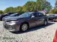 2019 Toyota Camry Hybrid LE z VIN 4T1B31HK9KU512469, wystawiony jako Copart lot #85112345 z przebiegiem 83 416 mil mil oraz Szkoda całkowita • Salvage title. Historia ofert i sprzedaży dostępna na DreamBid. Obrazek 1.