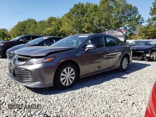 2019 Toyota Camry Hybrid LE с VIN 4T1B31HK9KU512469, выставлен на аукционе Copart как лот 85112345 с пробегом 83 416 миль миль и Списание • Salvage title. История ставок и продаж доступна на DreamBid. Изображение 1.
