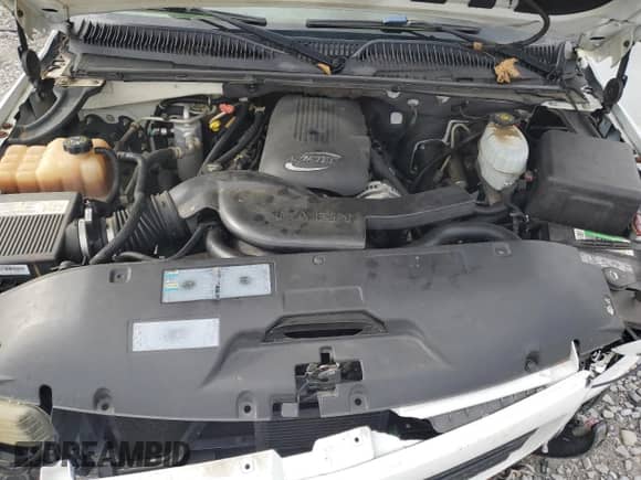 2004 Chevrolet Tahoe LT with VIN 1GNEC13ZX4J127939, listed as a Copart auction lot 70814515 with Not provided miles and Salvage title. Bid and sale history available at DreamBid. Image 12.
