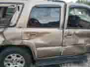 2004 Chevrolet Tahoe LS with VIN 1GNEC13ZX4R152843, listed as a Copart auction lot 51775035 with 294,488 mi miles and Salvage title. Bid and sale history available at DreamBid. Image 11.