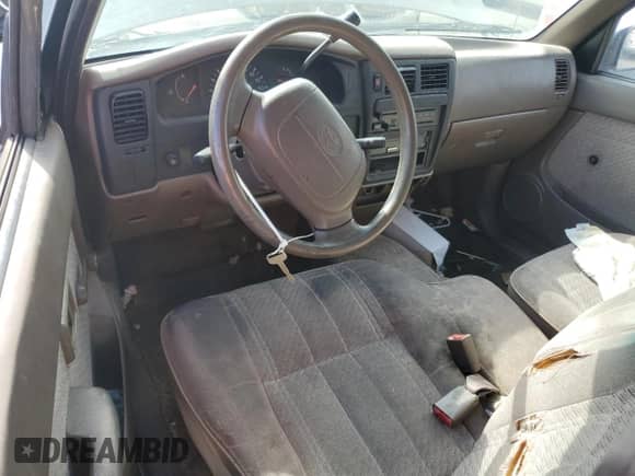 1997 Toyota Tacoma z VIN 4TAVL52N5VZ285036, wystawiony jako Copart lot #85907835 z przebiegiem 306 339 mil mil oraz Czysty tytuł • Clean title. Historia ofert i sprzedaży dostępna na DreamBid. Obrazek 8.