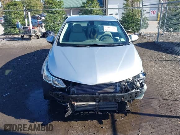 2017 Chevrolet Cruze LS z VIN 1G1BC5SMXH7277036, wystawiony jako IAAI lot #43484591 z przebiegiem 141 941 mil mil oraz . Historia ofert i sprzedaży dostępna na DreamBid. Obrazek 13.