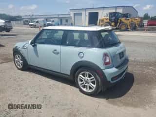 2013 MINI Hardtop S with VIN WMWSV3C50DT392465, listed as a Copart auction lot 58340735 with 40,731 mi miles and Salvage title. Bid and sale history available at DreamBid. Image 2.