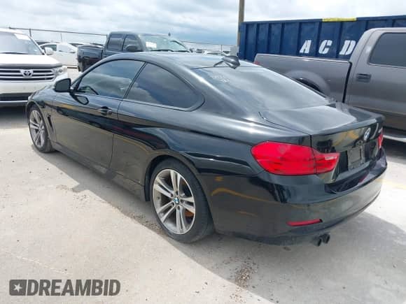 2015 BMW 4 Series 428i with VIN WBA3N3C58FK234971, listed as a IAAI auction lot 42468118 with 93,748 mi miles and . Bid and sale history available at DreamBid. Image 3.
