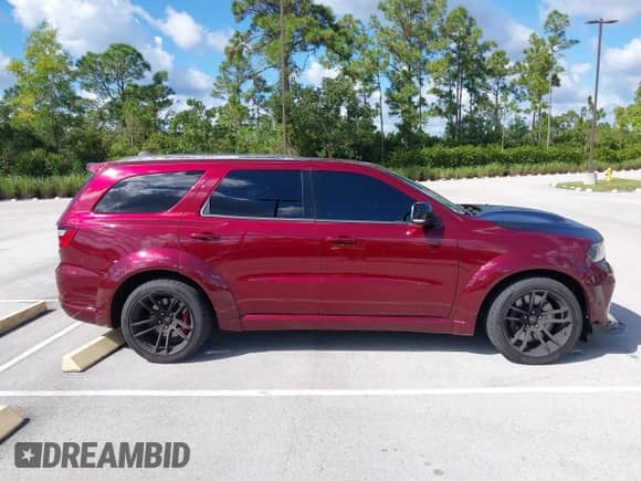 2021 Dodge Durango SRT Hellcat with VIN 1C4SDJH91MC716142, listed as a IAAI auction lot 43523331 with 37,058 mi miles and . Bid and sale history available at DreamBid. Image 13.
