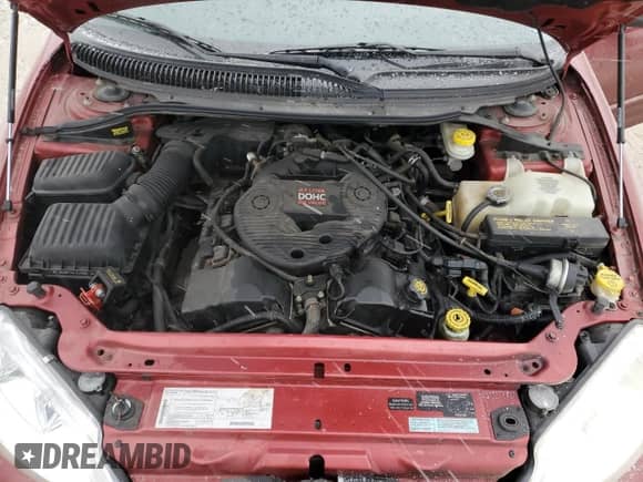 2000 Dodge Intrepid z VIN 2B3HD46R5YH352875, wystawiony jako Copart lot #83482874 z przebiegiem 73 997 mil mil oraz Czysty tytuł • Clean title. Historia ofert i sprzedaży dostępna na DreamBid. Obrazek 11.