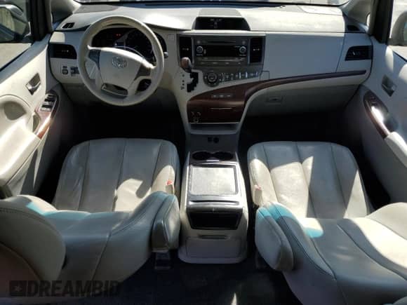 2012 Toyota Sienna XLE AAS with VIN 5TDYK3DC7CS275515, listed as a Copart auction lot 63839725 with 149,968 mi miles and Salvage title. Bid and sale history available at DreamBid. Image 8.