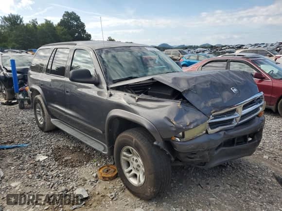 2002 Dodge Durango SLT with VIN 1B4HS48Z82F212178, listed as a Copart auction lot 71692045 with 243,065 mi miles and Salvage title. Bid and sale history available at DreamBid. Image 4.