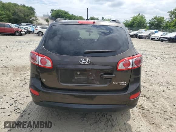 2011 Hyundai Santa Fe GLS z VIN 5XYZGDAB0BG036133, wystawiony jako Copart lot #68527765 z przebiegiem 146 706 mil mil oraz Szkoda całkowita • Salvage title. Historia ofert i sprzedaży dostępna na DreamBid. Obrazek 6.