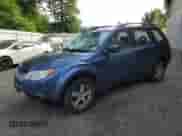 2011 Subaru Forester X z VIN JF2SHABC1BG711507, wystawiony jako Copart lot #64486475 z przebiegiem 173 037 mil mil oraz Szkoda całkowita • Salvage title. Historia ofert i sprzedaży dostępna na DreamBid. Obrazek 1.