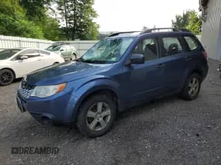 2011 Subaru Forester X z VIN JF2SHABC1BG711507, wystawiony jako Copart lot #64486475 z przebiegiem 173 037 mil mil oraz Szkoda całkowita • Salvage title. Historia ofert i sprzedaży dostępna na DreamBid. Obrazek 1.