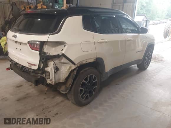 2018 Jeep Compass Trailhawk z VIN 3C4NJDDB9JT501558, wystawiony jako IAAI lot #42839010 z przebiegiem 88 554 mil mil oraz . Historia ofert i sprzedaży dostępna na DreamBid. Obrazek 4.