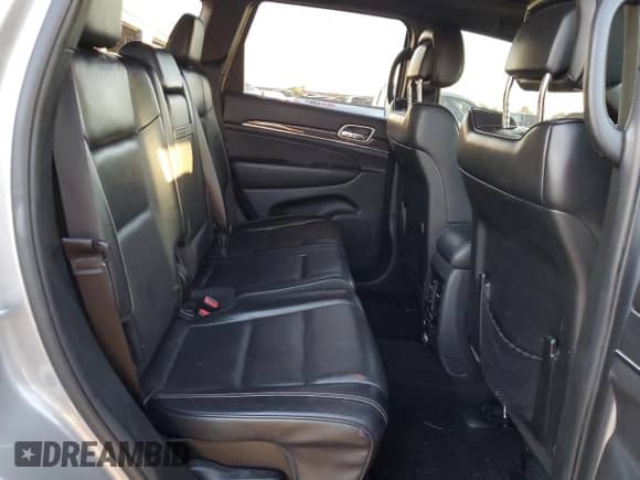 2017 Jeep Grand Cherokee Overland with VIN 1C4RJFCGXHC756588, listed as a Copart auction lot 84282675 with 101,960 mi miles and Salvage title. Bid and sale history available at DreamBid. Image 11.