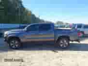 2016 Toyota Tacoma SR5 z VIN 5TFAZ5CN1GX009418, wystawiony jako IAAI lot #43365469 z przebiegiem 180 719 mil mil oraz . Historia ofert i sprzedaży dostępna na DreamBid. Obrazek 14.