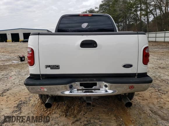 2002 Ford F-150 XLT с VIN 1FTRW08682KC80529, выставлен на аукционе Copart как лот 37546994 с пробегом 159 980 миль миль и Списание • Salvage title. История ставок и продаж доступна на DreamBid. Изображение 6.