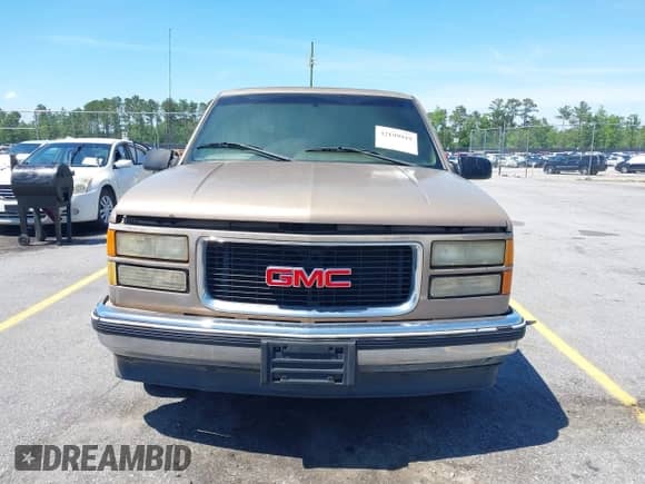 1996 GMC Sierra 1500 z VIN 2GTEC19M3T1502695, wystawiony jako IAAI lot #42199919 z przebiegiem 285 889 mil mil oraz . Historia ofert i sprzedaży dostępna na DreamBid. Obrazek 12.