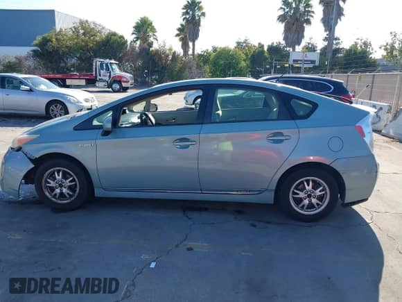 2012 Toyota Prius One with VIN JTDKN3DU2C1497804, listed as a IAAI auction lot 43281300 with 237,493 mi miles and . Bid and sale history available at DreamBid. Image 14.