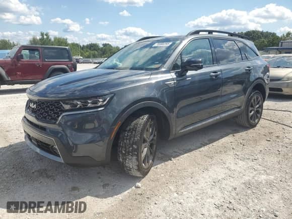 2023 Kia Sorento X-Line SX Prestige with VIN 5XYRKDLFXPG218847, listed as a Copart auction lot 70990395 with 32,534 mi miles and Salvage title. Bid and sale history available at DreamBid. Image 1.