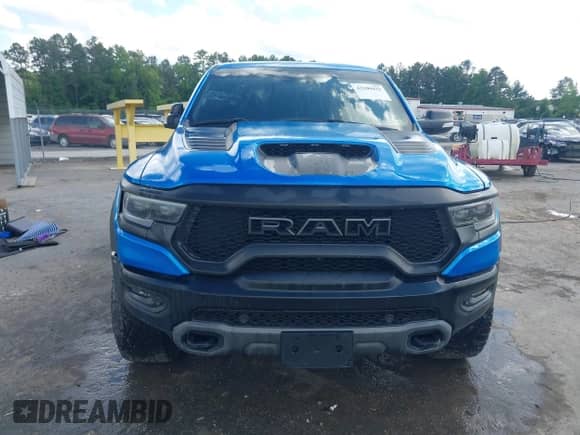 2021 Ram 1500 TRX with VIN 1C6SRFU98MN804461, listed as a IAAI auction lot 42300032 with 28,735 mi miles and . Bid and sale history available at DreamBid. Image 12.