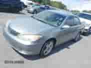 2006 Toyota Camry STD with VIN 4T1BE30K26U687900, listed as a IAAI auction lot 43317220 with 288,486 mi miles and . Bid and sale history available at DreamBid. Image 2.