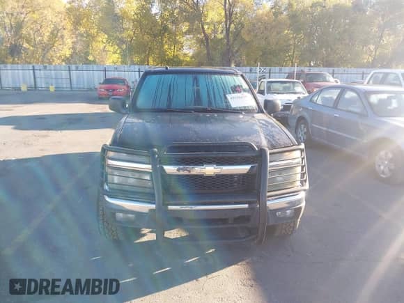 2008 Chevrolet Colorado 2LT z VIN 1GCDT13E088172337, wystawiony jako IAAI lot #43526135 z przebiegiem 190 741 mil mil oraz . Historia ofert i sprzedaży dostępna na DreamBid. Obrazek 12.