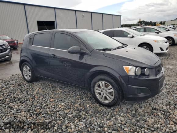 2013 Chevrolet Sonic LT with VIN 1G1JC6SH1D4148361, listed as a Copart auction lot 90416425 with 221,468 mi miles and Clean title. Bid and sale history available at DreamBid. Image 4.