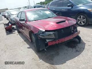 2022 Dodge Charger GT with VIN 2C3CDXHG1NH267781, listed as a IAAI auction lot 42607809 with 76,323 mi miles and . Bid and sale history available at DreamBid. Image 1.