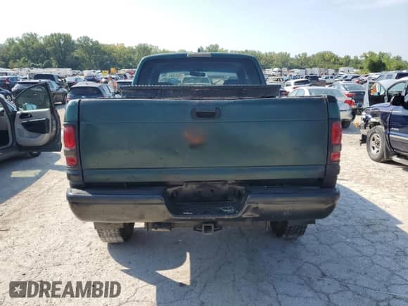 2002 Dodge 2500 with VIN 3B7KF23622M281527, listed as a Copart auction lot 70297065 with 317,620 mi miles and Salvage title. Bid and sale history available at DreamBid. Image 6.