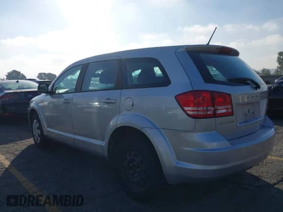 2014 Dodge Journey American Value with VIN 3C4PDCAB3ET241677, listed as a IAAI auction lot 43508874 with 167,198 mi miles and . Bid and sale history available at DreamBid. Image 3.