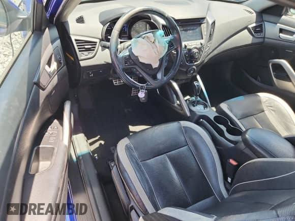 2014 Hyundai Veloster Turbo R-Spec с VIN KMHTC6AEXEU200820, выставлен на аукционе Copart как лот 68381355 с пробегом 77 736 миль миль и Списание • Salvage title. История ставок и продаж доступна на DreamBid. Изображение 8.