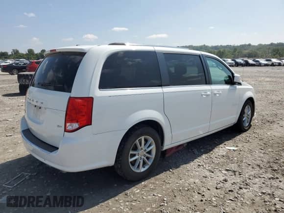 2020 Dodge Grand Caravan SXT z VIN 2C4RDGCGXLR201945, wystawiony jako Copart lot #71407495 z przebiegiem Nie podano mil oraz Szkoda całkowita • Salvage title. Historia ofert i sprzedaży dostępna na DreamBid. Obrazek 3.