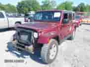 2007 Jeep Wrangler Unlimited Sahara z VIN 1J8GA59187L211825, wystawiony jako IAAI lot #42313099 z przebiegiem 107 554 mil mil oraz . Historia ofert i sprzedaży dostępna na DreamBid. Obrazek 18.