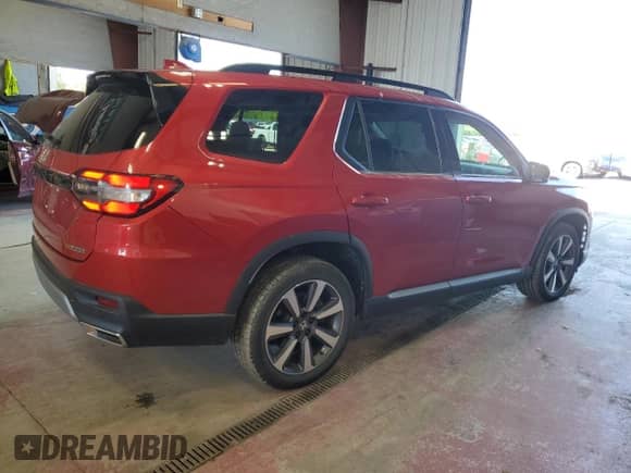 2023 Honda Pilot Touring with VIN 5FNYG1H73PB023953, listed as a Copart auction lot 70050455 with 45,315 mi miles and Salvage title. Bid and sale history available at DreamBid. Image 3.